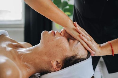 A person receiving a facial treatment